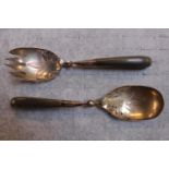 Pair of Continental Silver Bone handled Salad servers of pierced form