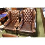 Pair of Good quality Maroon/Brown Leather Chesterfield Elbow chairs on cabriole legs