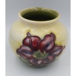Moorcroft Clematis on Green ground pattern Squat vase with impressed blue mark to base. 7cm in