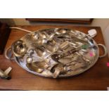 Oval Silver plated galleried tray on paw feet and a collection of assorted White metal flatware