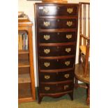 Seven drawer Wellington Type Chest of drawers with brass drop handles and splayed bracket feet. 47cm