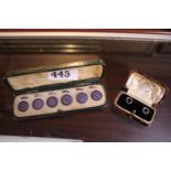 Cased Set of Silver enamelled dress studs and a Cased set of Munsey of Cambridge dress studs