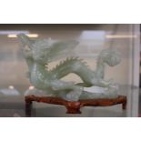 Jade carved figure of Dragon mounted on wooden plinth