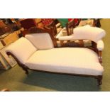 Edwardian Walnut framed Chaise longue with carved back and upholstered supports