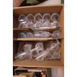 Large box of assorted glassware inc. Champagne flutes etc