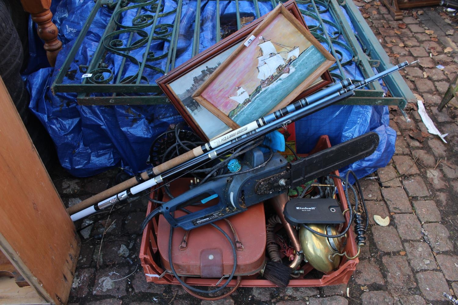 Box of assorted Bygones and a Einhell Chainsaw