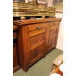 Edwardian Walnut Sideboard with brass drop handles and carved panel doors