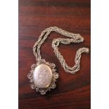 Ornate Silver Pendant with floral surround and chain 28g total weight