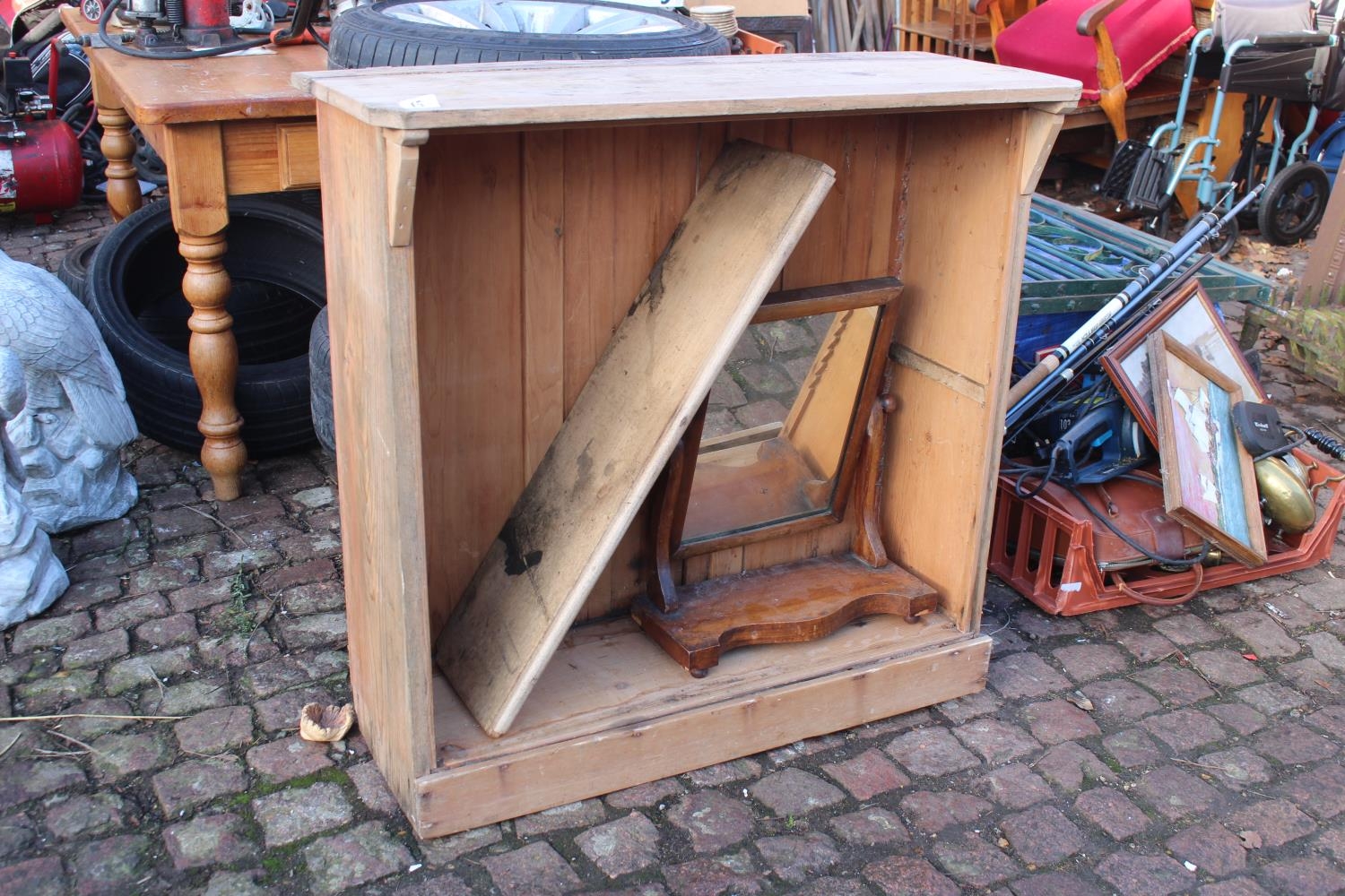 Stripped Pine Bookcase and a Victorian Swing mirror