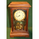Gustav Becker Oak cased clock with numeral dial and Brass movement