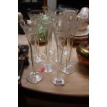 Set of 8 etched Champagne flutes with applied gilded decoration