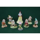 EIGHT ROYAL DOULTON FIGURES FROM SNOW WHITE AND THE SEVEN DWARFS, comprising Snow White SW9, Doc