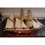 Scratch built model of a sailing ship with label META
