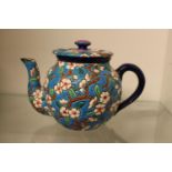 Blue ground Prunus decorated Longwy of France teapot