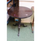 19thC Mahogany Wine table on turned stem over tripod paw feet