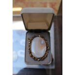 Late 19thC Oval Polished Agate Oval brooch with gilded setting