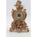 Ansonia clock Co ornate mantel clock with numeral dial with gilded decoration. 20cm in Height