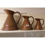 Set of 3 graduated Copper Ale Ewers 32cm to 17cm