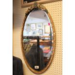 Oval Barbola ribbon framed mirror with bevel edge