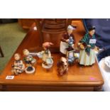 2 Royal Doulton Figurines The Orange Lady HN 1953 & Flora HN 2349, 3 Hummel's and a Weatherby Dog