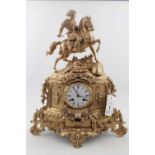 Fine 19thC French Gilded eight day clock with roman numeral dial marked Foy De Paris, with