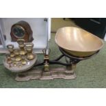 A Large Cast Iron Kitchen scales with detachable shaped brass pan and a set of Brass baluster