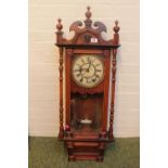 Victorian Walnut cased wall clock with Roman Numeral dial. 110cm in Height