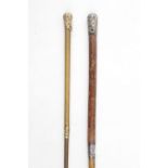 Swaine Adeney Yellow metal mounted riding crop and a Silver mounted riding crop