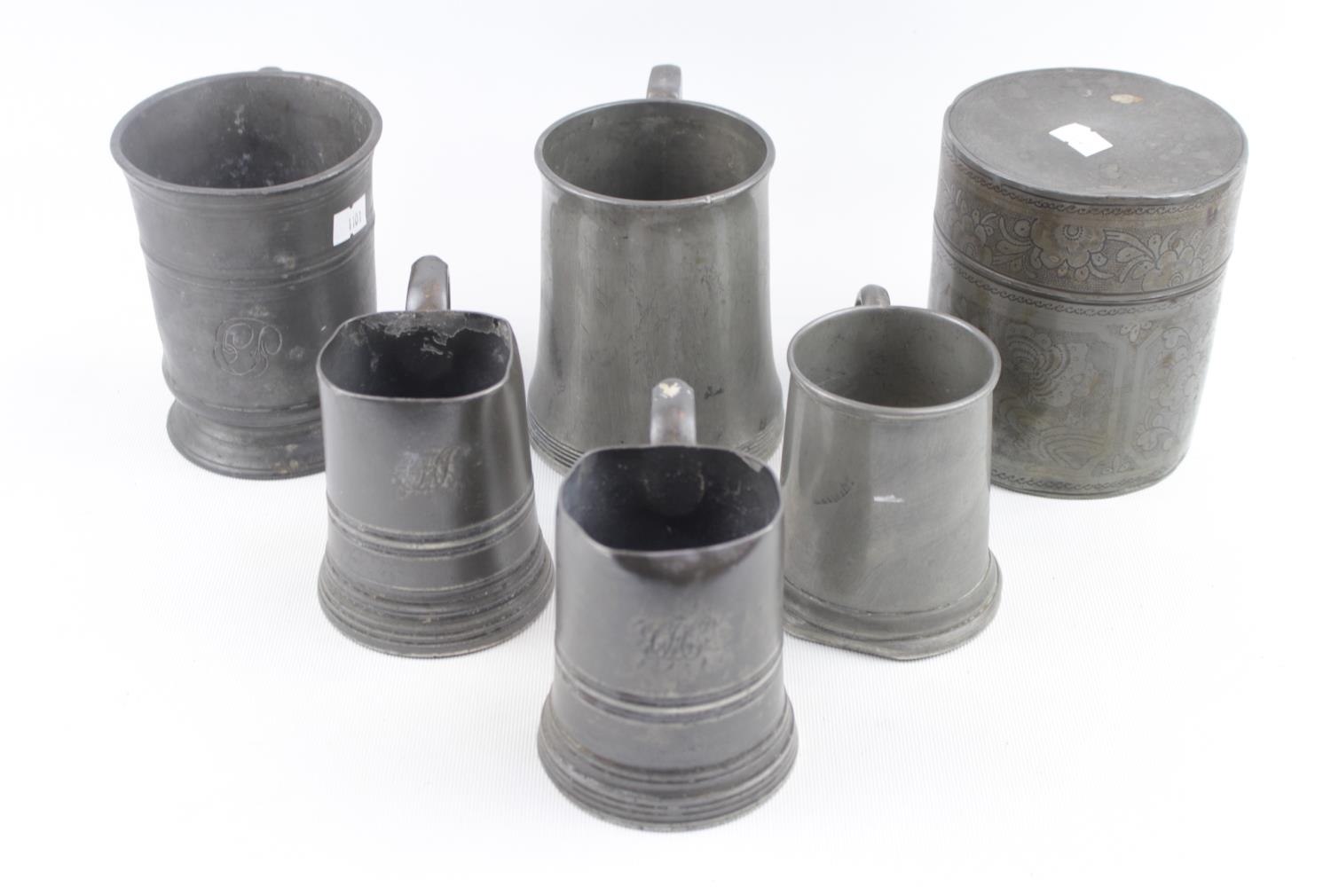 Collection of Pewter Tankards and a Pewter Lidded Tea caddy with engraved decoration