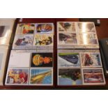 2 Albums of assorted Reproduction postcards and signs