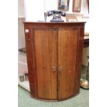 Georgian Bow fronted wall corner cabinet with shelved interior