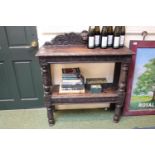 Late Victorian Oak carved 2 tier hall table with lions back pediment. 93cm in Diameter