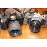 Nikon F5 Camera and a Canon AE4 and assorted accessories