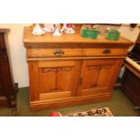 Oak Art Nouveau sideboard with pediment over 2 drawers and cupboard doors