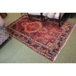 Good quality Persian Red ground rug. 240 x 140cm