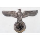 A German Eagle and Swastika cast alloy wall plaque wing span 37cm
