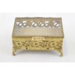 Good quality Gilt Metal Bijoux jewel box of foliate decoration with bevelled glass hinged top