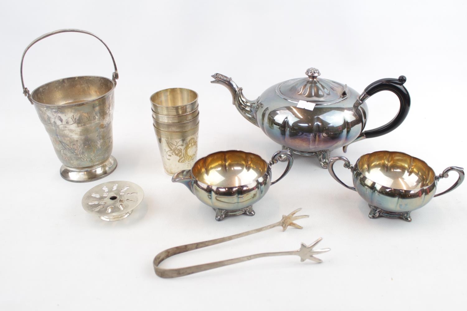 Collection of Silver Plated ware inc. 3 Piece Tea set, Sugar tongs etc