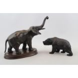 Cast Metal figure of a Elephant on wooden base and a Resin bronzed figure of a Bear