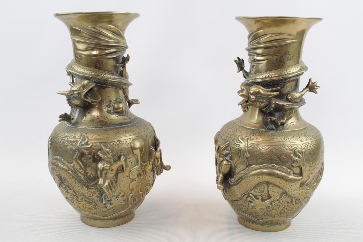 Pair of Chinese Brass Dragon decorated baluster vases with 4 character marks to base. 25cm in Height