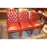 Set of 6 Good Quality Red Leather Button back dining chairs with tapering legs
