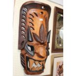 Large carved Indonesian wall mask