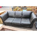 Leather 3 seater sofa on wooden turned feet