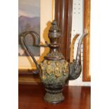 Chinese Heavy Bronze teapot with applied brass wiseman decoration. 27cm in Height