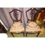 Pair of 2 Sheraton style Shield back chairs with upholstered seats over tapering legs