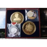 Two cased 24ct gold plated commemorative medals for the Coronation and Accession of Queen