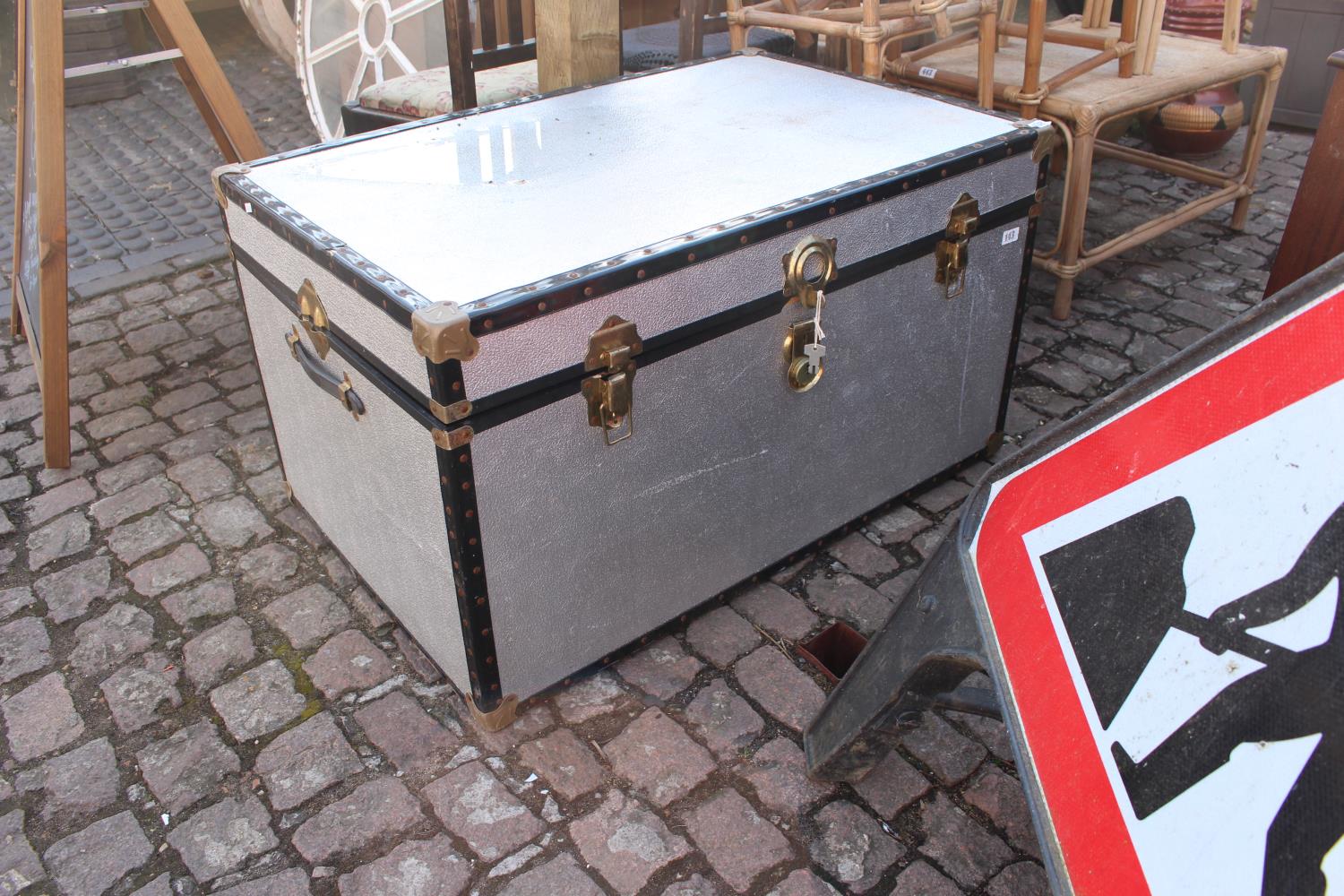 Metal bound travelling trunk