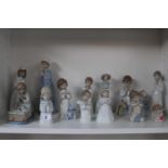 Collection of Lladro and Nao glazed figurines of Praying Figures (13)