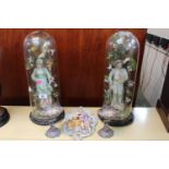 Pair of European ceramic figures under glass domes and wooden base. 45cm in Height, Pair of Silver