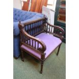Victorian Mahogany Elbow chair with turned spindle supports upholstered seat and reeded legs